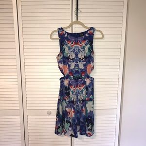 Blue pattern fit-and-flare dress with side cutouts